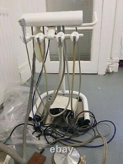 Dental Delivery Unit-brackette table with unit-working condition but used